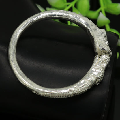 Silver baby bangle by TRIBAL ORNAMENTS featuring a solid, customizable tribal design, adjustable unisex kids kada made of 999 fine silver.