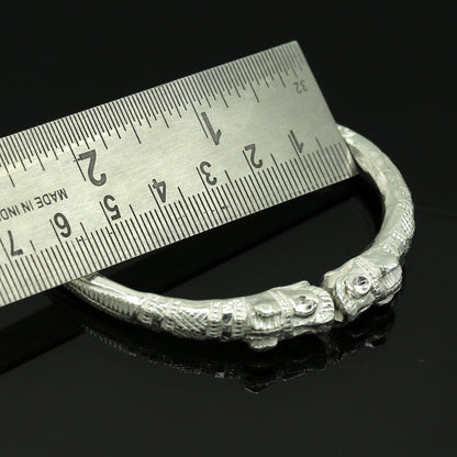 Vintage handmade 999 solid silver crocodile bangle with tribal design, adjustable for boys and girls, crafted by TRIBAL ORNAMENTS.