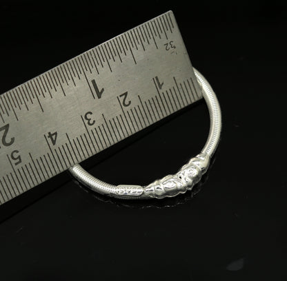 Sterling silver bangle bracelet with vintage crocodile face design, handmade tribal jewelry for newborns and kids, unisex style.