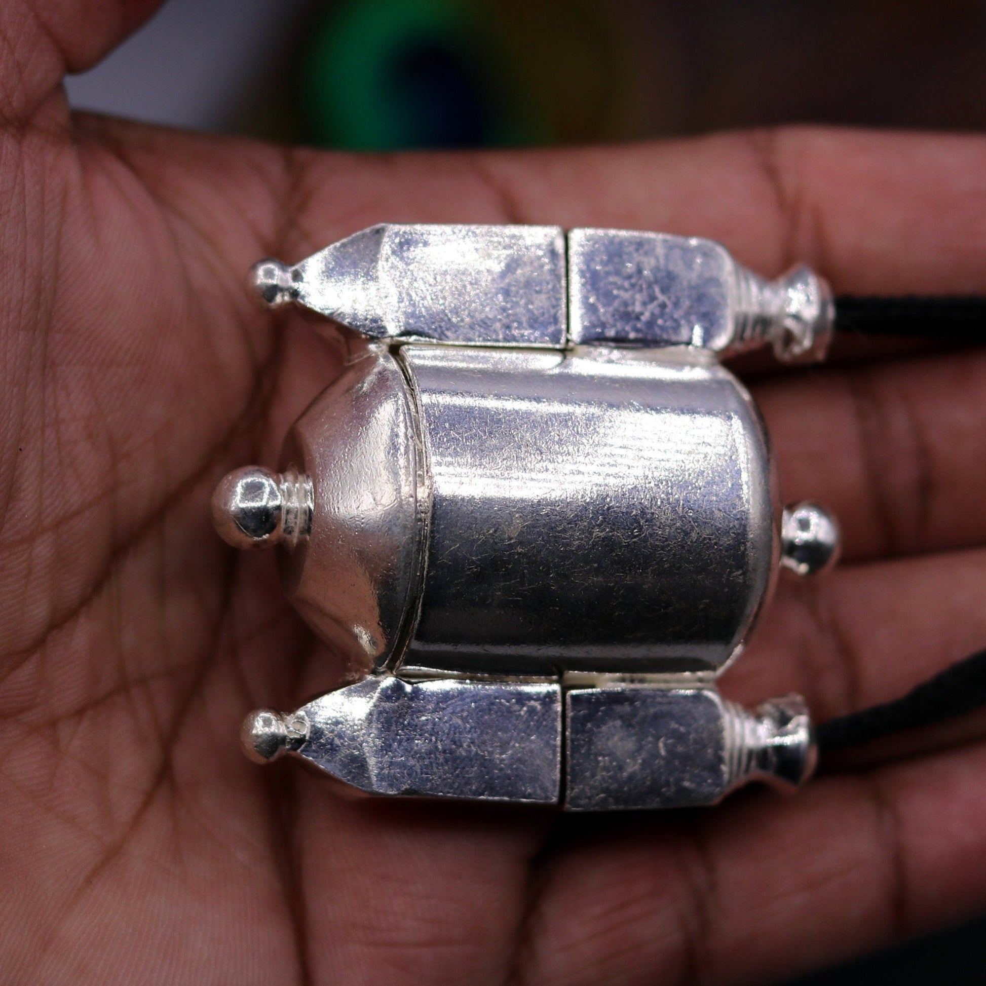Vintage sterling silver Lord Shiva Lingam box pendant by TRIBAL ORNAMENTS, featuring tribal design and intricate craftsmanship.
