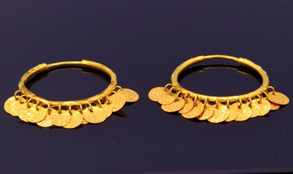 Handmade 22KT yellow gold hoop earrings with vintage tribal design from Rajasthan, India, showcasing traditional women's jewelry.