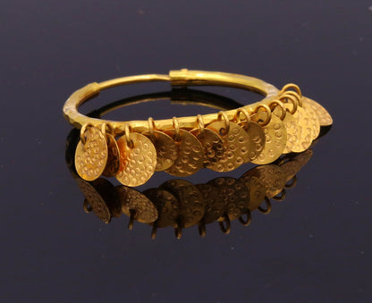 Vintage handmade 22KT yellow gold hoop earrings from Rajasthan tribal jewelry, featuring traditional tribal design and craftsmanship.