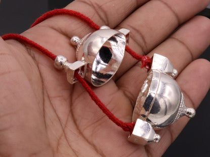 Vintage silver Lord Shiva Lingam box pendant, tribal amulet container with intricate design for spiritual jewelry.