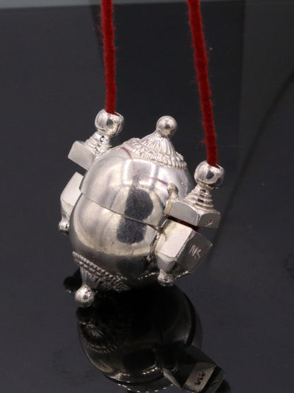 Vintage silver Lord Shiva Lingam box pendant, tribal jewelry casket container with detailed design and amulet storage.