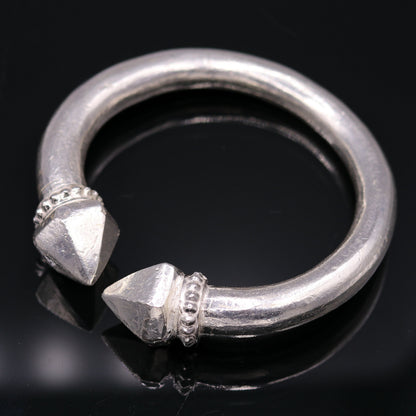 Vintage tribal sterling silver bangle cuff from Tribal Ornaments, handmade unisex jewelry with solid heavy design.