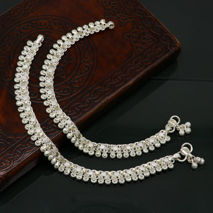 Vintage sterling silver ankle bracelet with tribal antique design, featuring solid craftsmanship and genuine jewelry style.