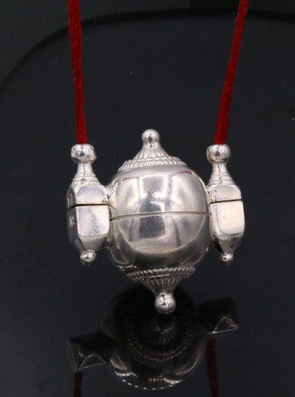 Vintage tribal silver Shiva Lingam box amulet pendant with intricate designs, used as prayer and mantra jewelry.