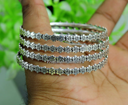 Vintage flower design 925 sterling silver bangle bracelet from Tribal Ornaments, with oxidized finish and tribal belly dance jewelry style