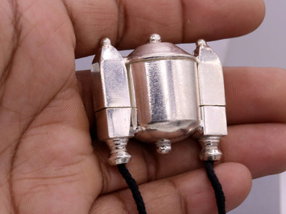 Vintage silver Shiva Lingam box pendant with intricate tribal design, handmade jewelry container and amulet from Tribal Ornaments.