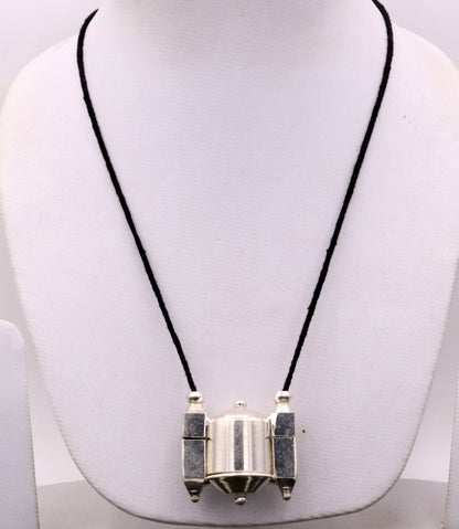 Vintage silver Shiva Lingam box and amulet pendant from Tribal Ornaments, featuring handmade tribal jewelry design from India.