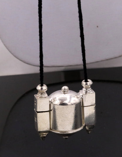 Vintage silver Shiva Lingam box jewelry with intricate tribal design, pendant, and amulet container from Tribal Ornaments.