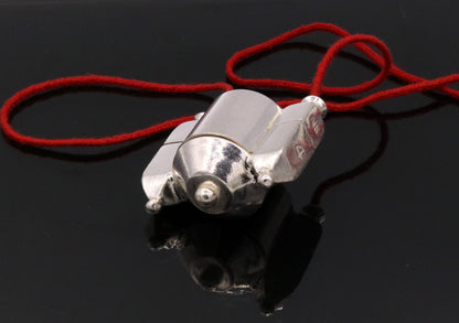 Vintage silver Shiva Lingam pendant and prayer box, tribal jewelry with intricate designs, handmade in Rajasthan, India.