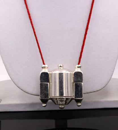 Vintage silver Shiva Lingam pendant and prayer box from Tribal Ornaments, featuring handmade tribal jewelry and Indian idol design.