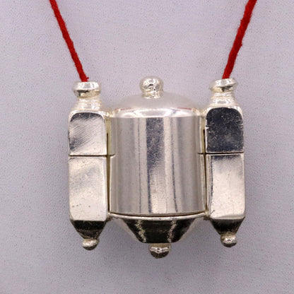 Vintage silver Shiva Lingam pendant and prayer box, tribal jewelry with intricate Indian idol design from Rajasthan.
