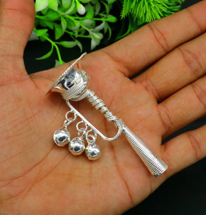 Vintage Indian sterling silver baby Krishna whistle with bells, traditional music instrument and temple-inspired design by TRIBAL ORNAMENTS.