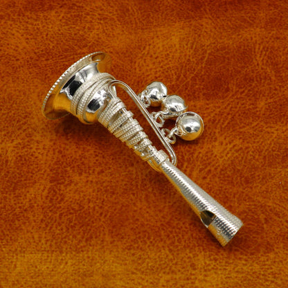 Vintage Indian sterling silver baby Krishna whistle with bells, toy musical instrument, and temple-style design by TRIBAL ORNAMENTS.