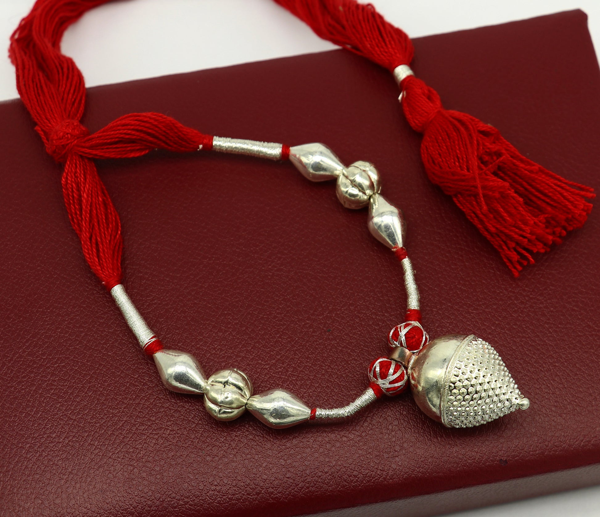 Vintage Indian sterling silver beads thread charm necklace, tribal wedding choker with intricate traditional design and silver accents.