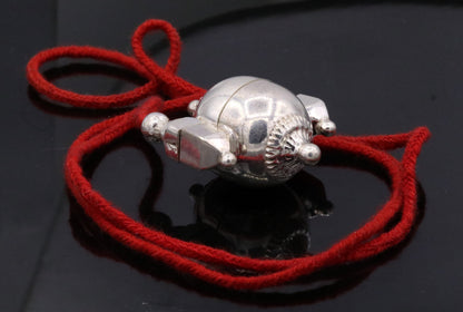 Vintage silver Shiva pendant container box from Tribal Ornaments, handcrafted tribal jewelry with intricate detailing.