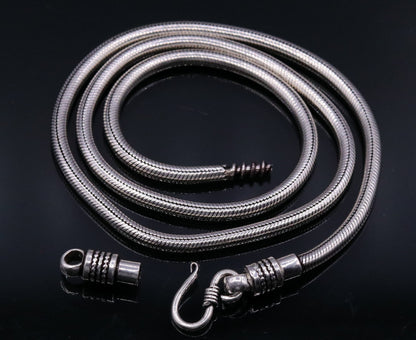 Vintage-style 925 sterling silver snake chain necklace with a flexible screw design, handmade tribal jewelry.