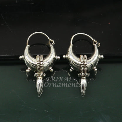 Sterling silver vintage-style tribal hoop earrings with traditional ethnic design, suitable for men and women, handmade Bali jewelry.