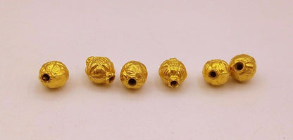 Handmade vintage-style beaded jewelry with engraved traditional tribal design by TRIBAL ORNAMENTS