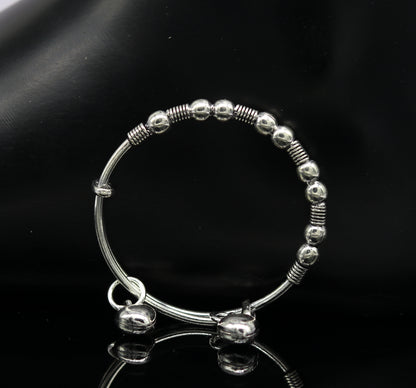 Vintage oxidized 925 sterling silver adjustable baby bangle bracelet with tribal charm, unisex kids jewelry by TRIBAL ORNAMENTS.