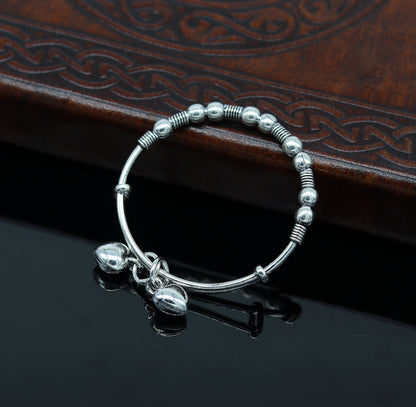 Vintage oxidized 925 sterling silver baby bangle bracelet with tribal charm, adjustable unisex kids jewelry by Tribal Ornaments.