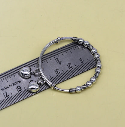 Vintage oxidized 925 sterling silver adjustable baby bangle bracelet with tribal charm, unisex kids jewelry by TRIBAL ORNAMENTS.