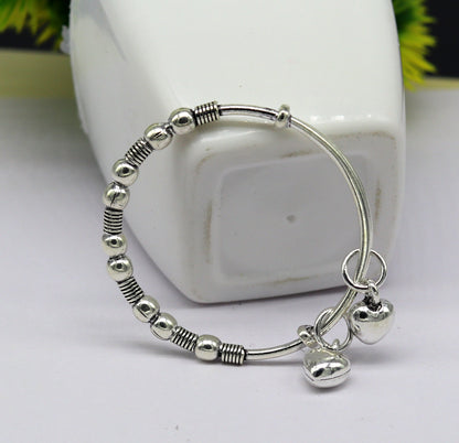 Vintage style oxidized 925 sterling silver adjustable baby bangle bracelet with tribal charm, unisex kids jewelry by Tribal Ornaments