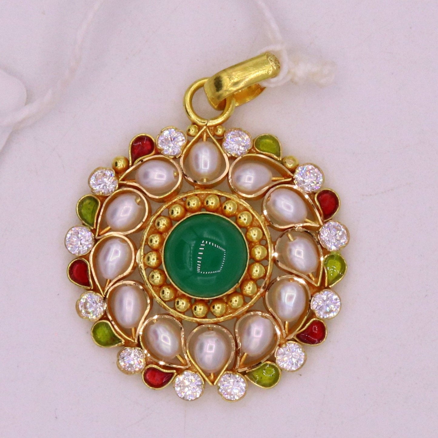 Vintage 22K yellow gold handmade pendant with white pearl and green stone, featuring intricate Jadau Indian jewelry design.