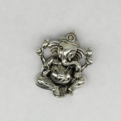 Sterling silver Lord Ganesha pendant from TRIBAL ORNAMENTS, featuring intricate handmade design and unisex personalized jewelry.
