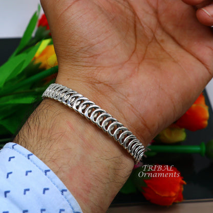 Sterling silver adjustable bangle cuff bracelet with unique tribal design, suitable for boys and girls wrist jewelry.