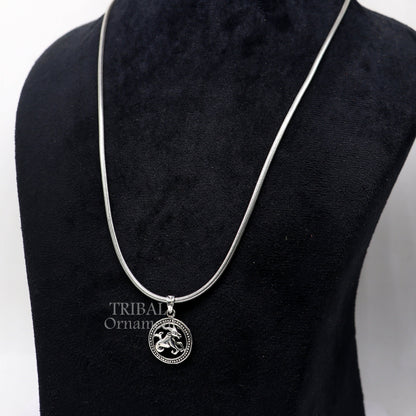 925 sterling silver Capricorn zodiac pendant featuring Makar Rashi symbol, tribal-style horoscope jewelry by Tribal Ornaments.