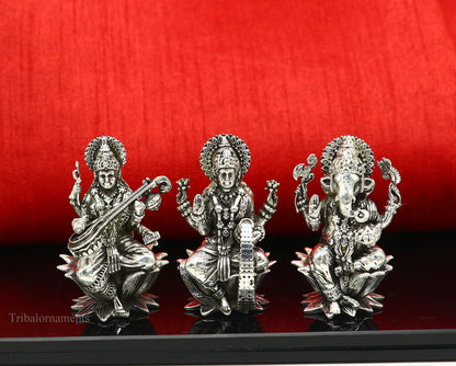 Small 2-inch handmade 925 sterling silver Hindu idols of Ganesha, Laxmi, and Saraswati for puja rituals, crafted by Tribal Ornaments.