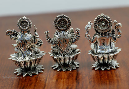 Small 925 Sterling silver Hindu idols of Ganesha, Laxmi, and Saraswati, handcrafted puja figurines by Tribal Ornaments.