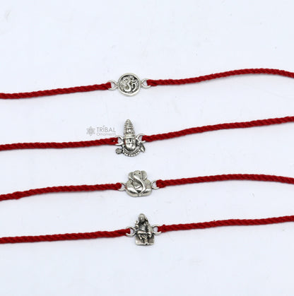 Handmade 925 sterling silver Ganesha, Sai Baba, Tirupati idols thread rakhi bracelet by TRIBAL ORNAMENTS, featuring unique divine god figures.