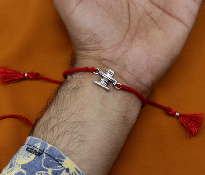 Handmade 925 sterling silver Ganesha, Shiva Lingam, Sai Baba idols thread rakhi bracelet by Tribal Ornaments.