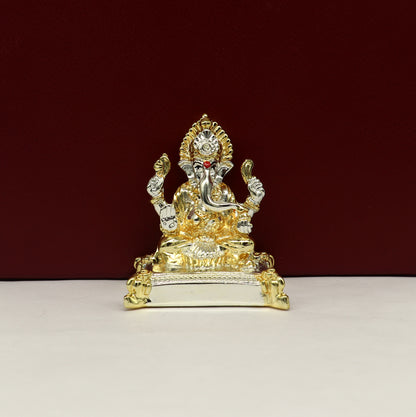 Silver Lord Ganesha idol with exterior silver covering, wax, and marble interior, crafted by Tribal Ornaments.