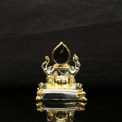 Silver Ganesh idol by Tribal Ornaments featuring a silver cover and wax and marble interior, showcasing Lord Ganesha in detailed craftsmanship.