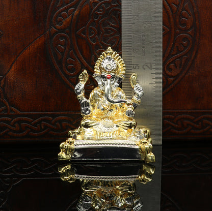 Silver Lord Ganesha idol by Tribal Ornaments with silver covering, wax and marble interior, showcasing intricate craftsmanship.