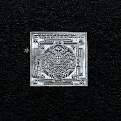 Handmade 3cm x 3cm sterling silver Shree Kubera Yantram for wealth and prosperity, a divine Hindu puja article by Tribal Ornaments.