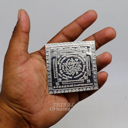 Handmade 925 sterling silver idol of Shree Kubera Yantram for wealth and prosperity, used as a divine puja article.