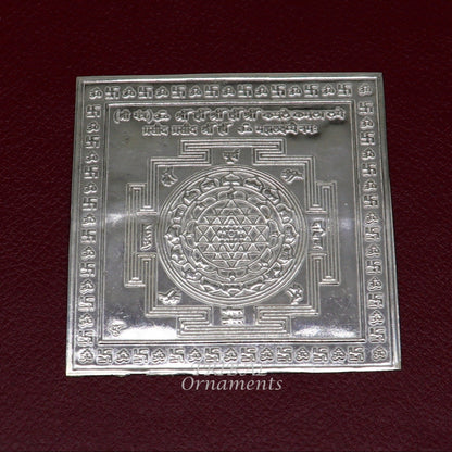 Handmade 925 sterling silver idol of Shree Kubera Yantram for wealth and prosperity, used as a divine puja article.