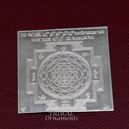 Handmade 925 sterling silver idol of Shree Kubera Yantram for wealth and prosperity, used as a divine puja article.