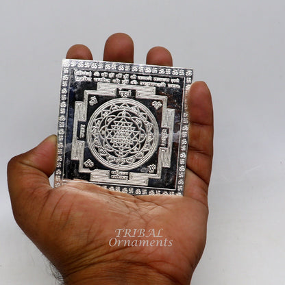 Handmade 925 sterling silver idol of Shree Kubera or Shri Yantram for wealth and prosperity, used as a divine puja article.