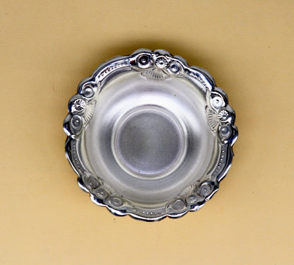 Handcrafted 999 fine silver bowl from TRIBAL ORNAMENTS, lightweight puja utensil with intricate silver work and elegant design.
