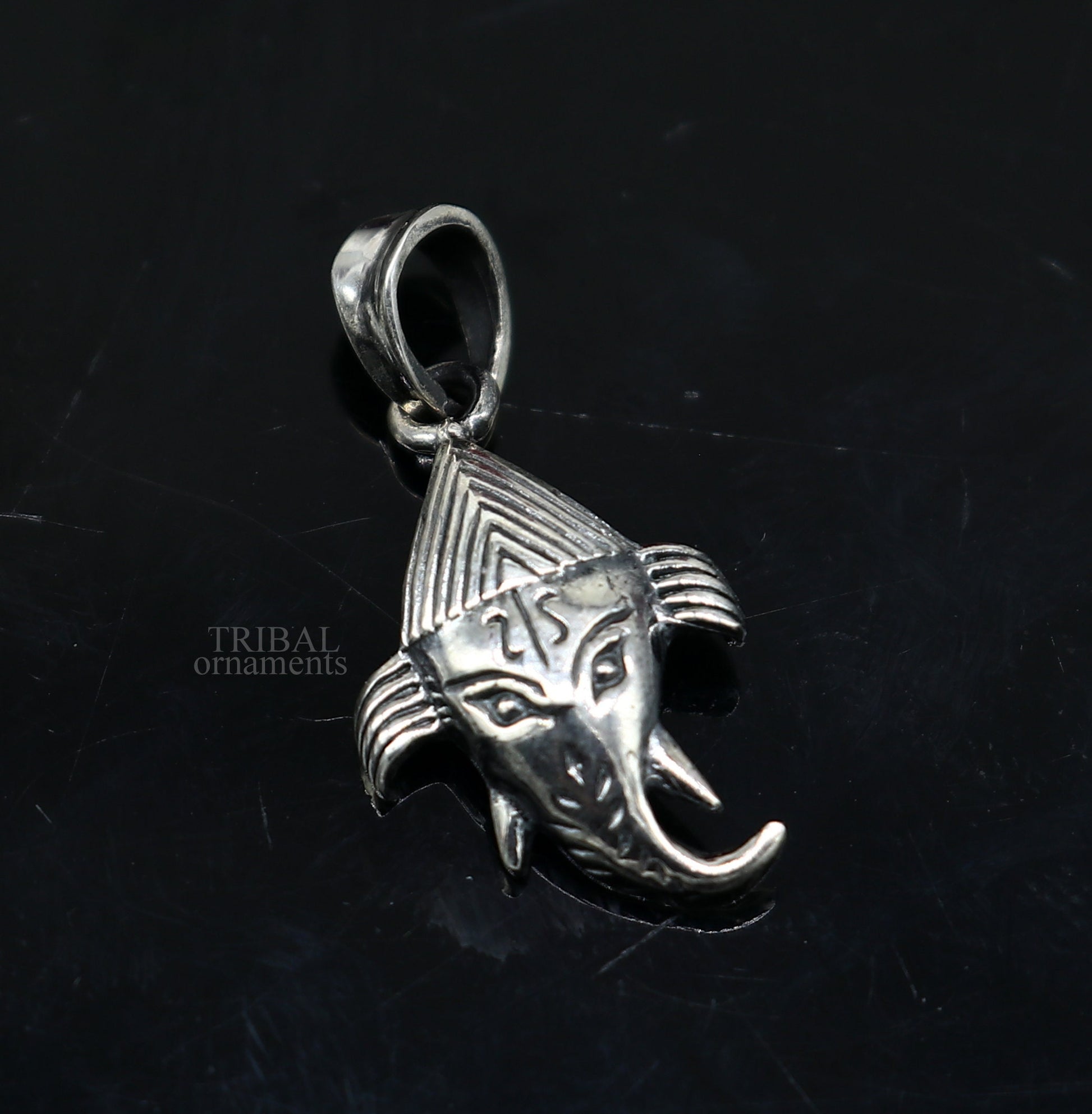 Sterling silver Lord Ganesha pendant by TRIBAL ORNAMENTS, unisex jewelry with detailed design, perfect for personalized gift-giving.