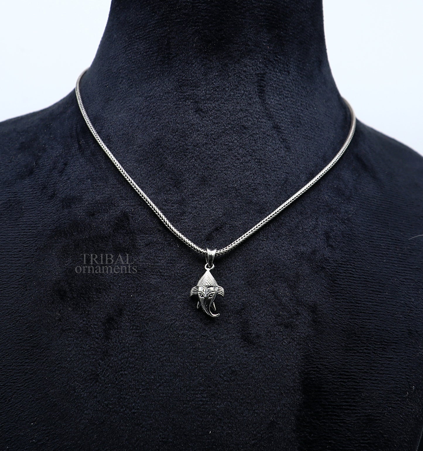 Sterling silver Lord Ganesha pendant by TRIBAL ORNAMENTS, unisex personalized jewelry with intricate design for gift-giving.