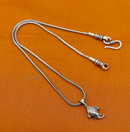 Sterling silver Lord Ganesha pendant by TRIBAL ORNAMENTS, unisex personalized jewelry with intricate design.