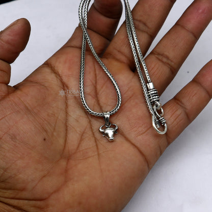 925 silver Bull face pendant from Tribal Ornaments, featuring intricate unisex jewelry design with wheat chain necklace.